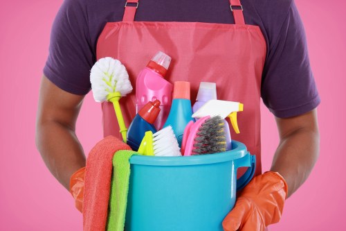Professional carpet cleaning team discussing a service issue