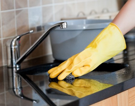 Professional mattress cleaning service in a Merton home bedroom