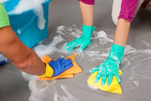 Professional carpet cleaning team introducing About Us Carpet Cleaners Merton