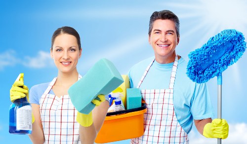 Carpet cleaner restoring a stained carpet in Merton